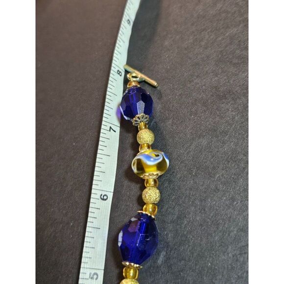 Blue and gold beaded bracelet - Picture 9 of 12